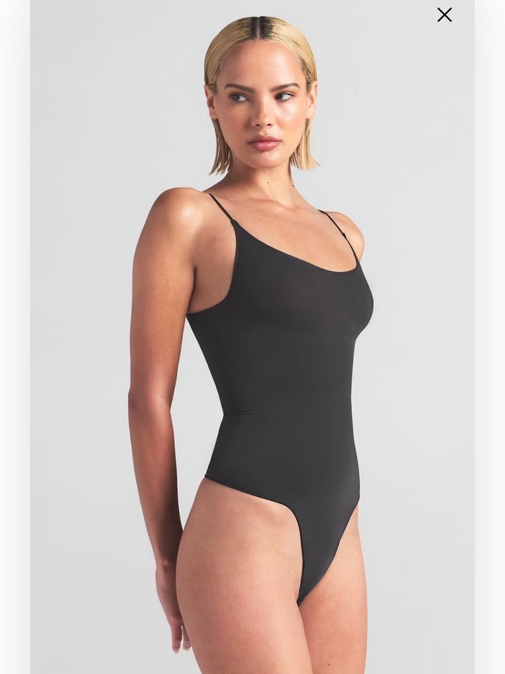 SKIMS sheer seamless thong bodysuit in onyx